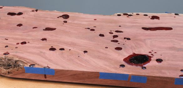 Epoxy fills defects in a live-edge slab